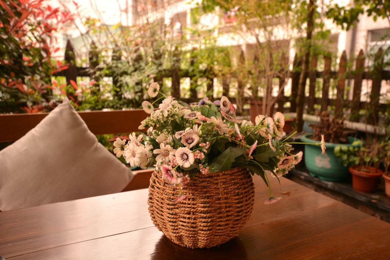 Floral Hotel - Baihui Living Zhangjiajie Buitenkant foto